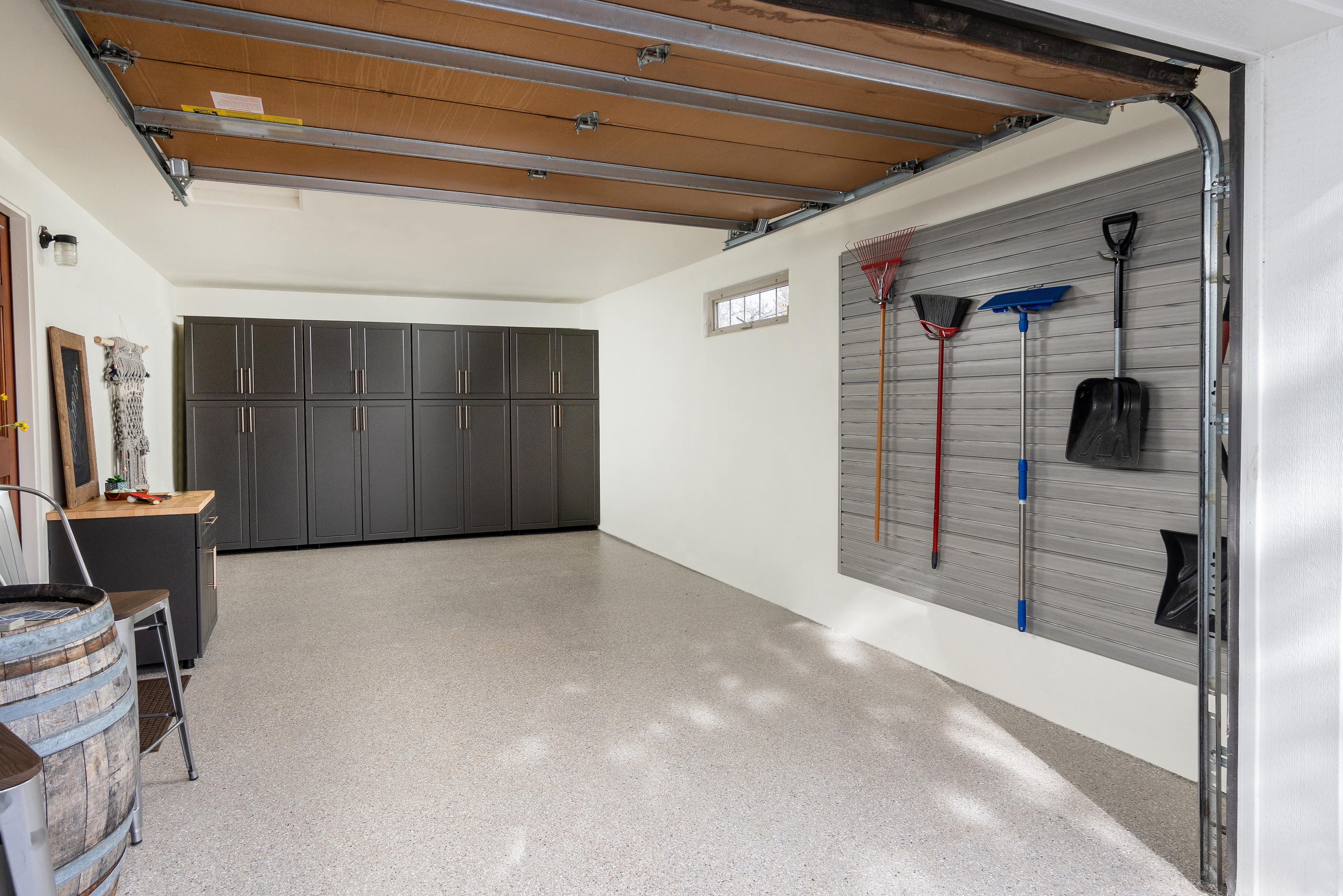 Professional garage organization with custom cabinets